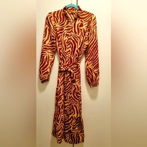 Kitri dress. Shirt dress, zebra stripe, neck ruffles, layers skirt, belt